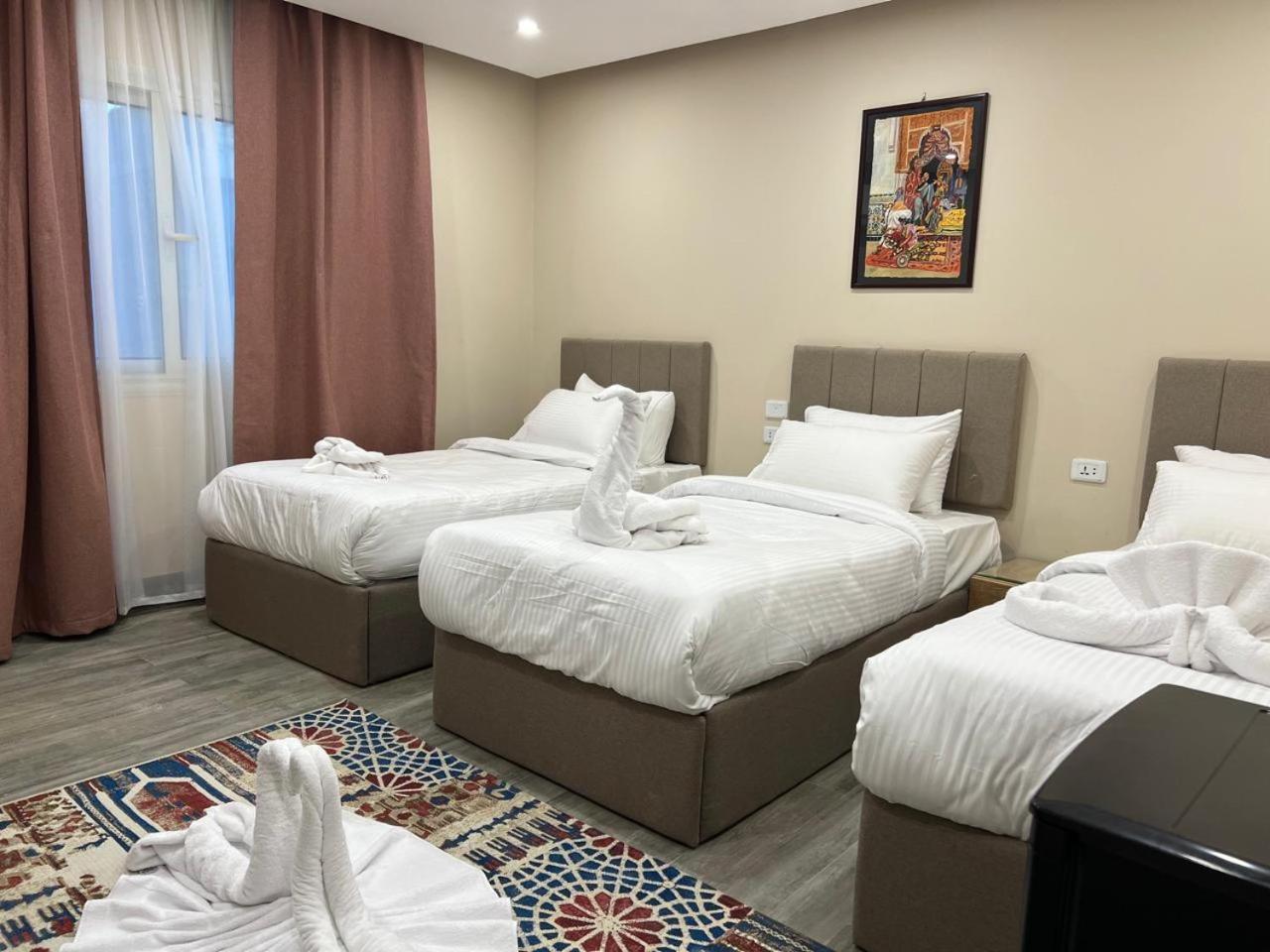 Pyramids Hotel Kafret el-Gabal Buitenkant foto