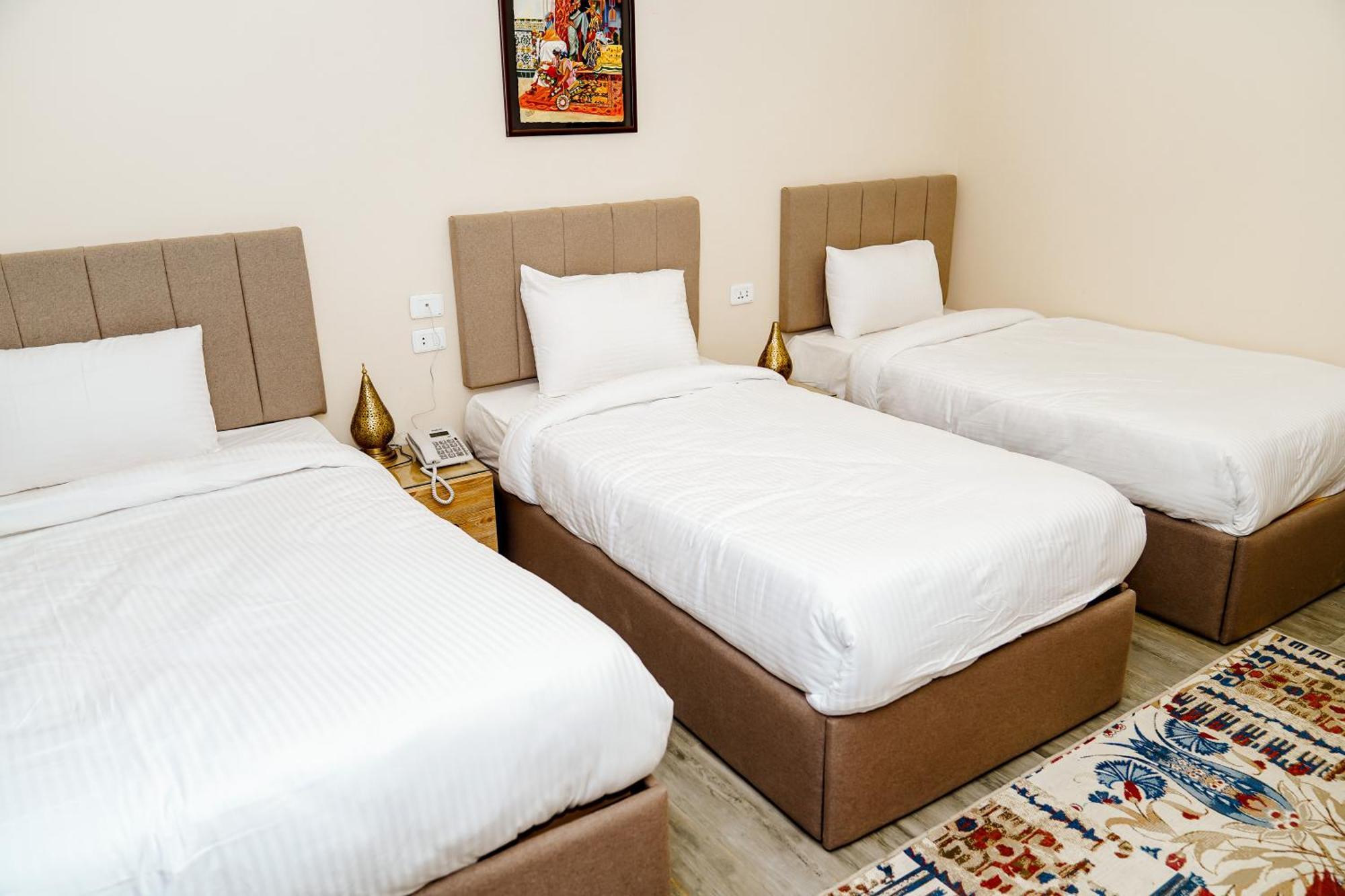Pyramids Hotel Kafret el-Gabal Buitenkant foto